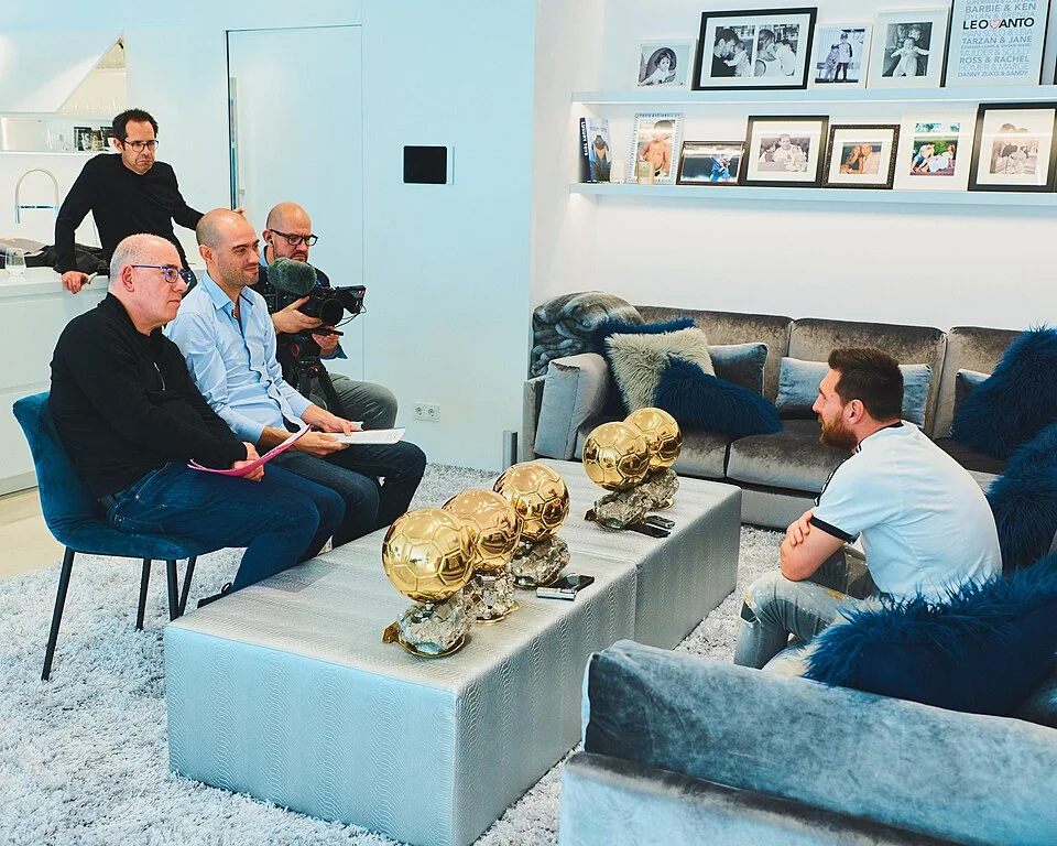 Lionel Messi at home with his Ballon d'Or trophies during an interview