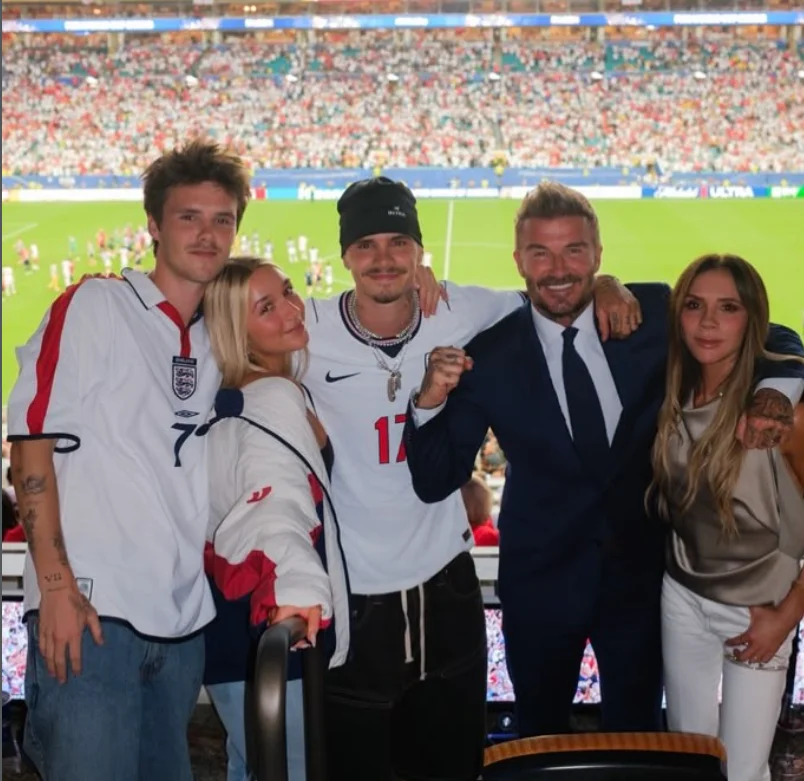 David Beckham with Victoria Beckham and their children Romeo, Cruz, and Harper at a stadium