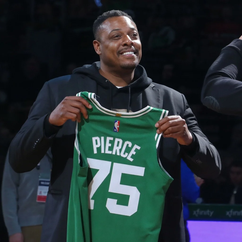 Paul Pierce holding his NBA 75th Anniversary Team Celtics jersey during the 2022 All-Star weekend celebrations