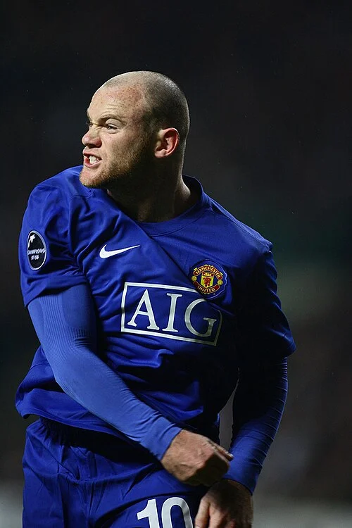 Wayne Rooney in Manchester United's blue away kit during a Champions League match