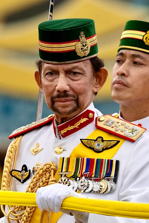 Sultan Hassanal Bolkiah, the reigning monarch of Brunei and uncle of Faiq Bolkiah, in ceremonial military uniform