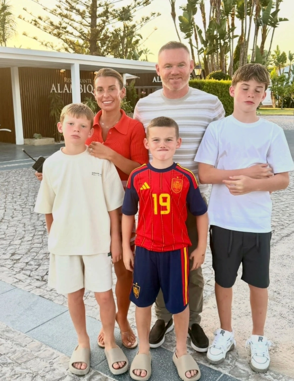 Wayne Rooney with his wife Coleen Rooney and their four sons on a family holiday
