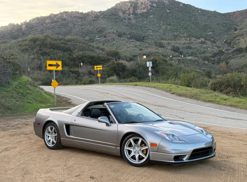 Matt Farah's silver 2005 Acura NSX parked on a mountain road in Los Angeles