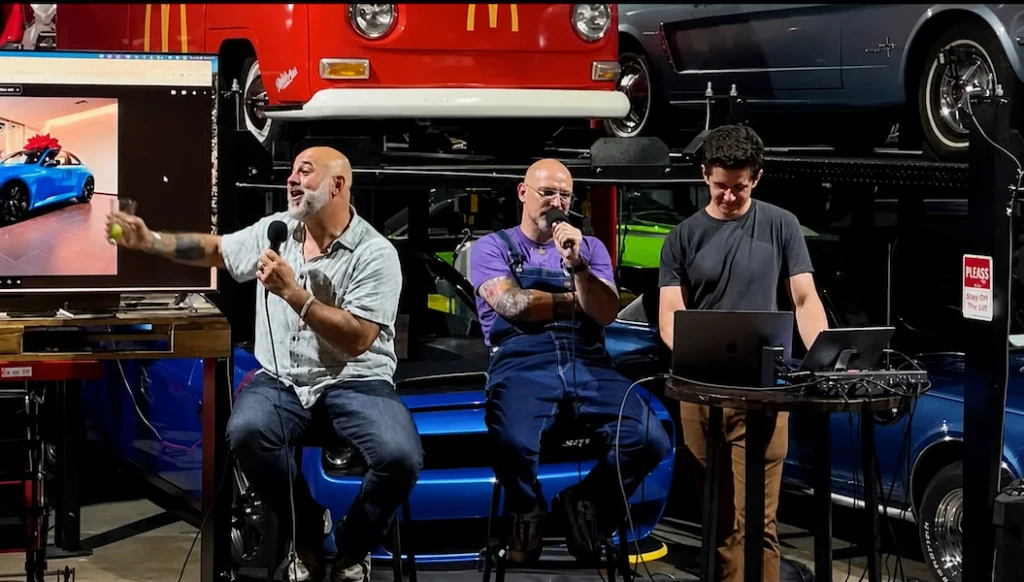 Matt Farah and Zack Klapman hosting The Smoking Tire podcast in their garage studio